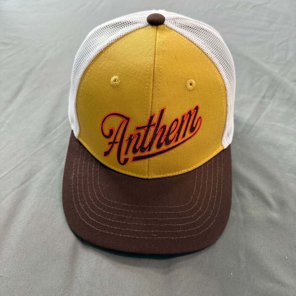 Anthem Yellow and Brown Trucker Hat with White Mesh Back and Stars